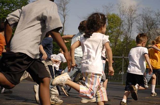 Children running in PE class