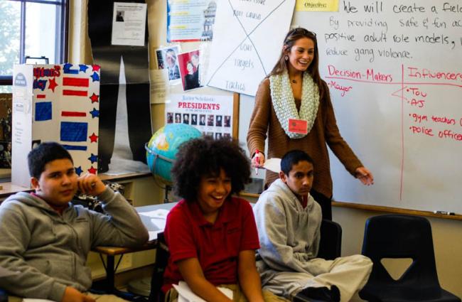 students and teacher in classroom