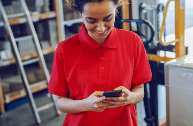 Young woman looking at her phone