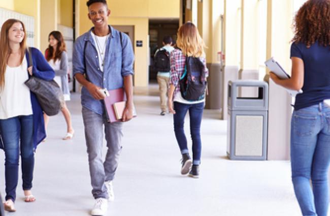 Students walking in a school hallway