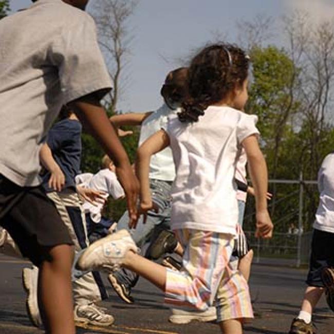 Children running in PE class
