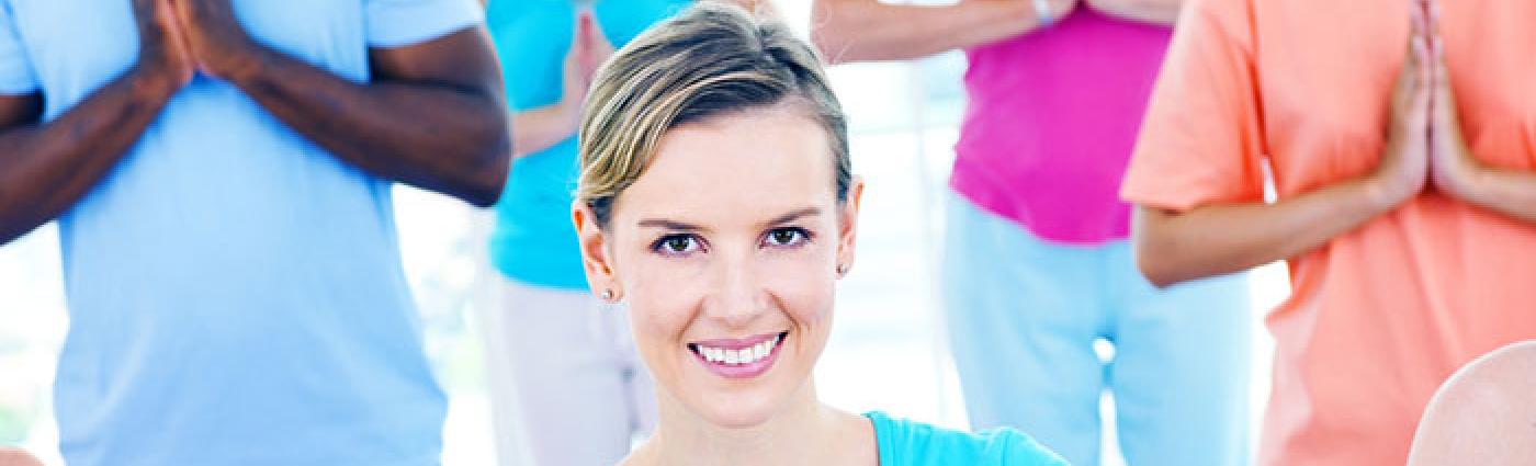 Image of people doing yoga.