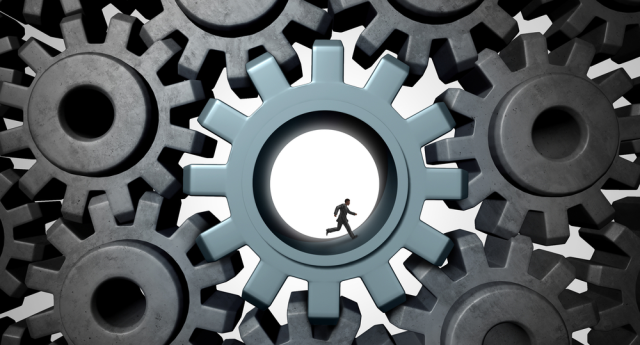 Person running inside a cog surrounded by other cogs, representing the multidimensionality of systemic racism